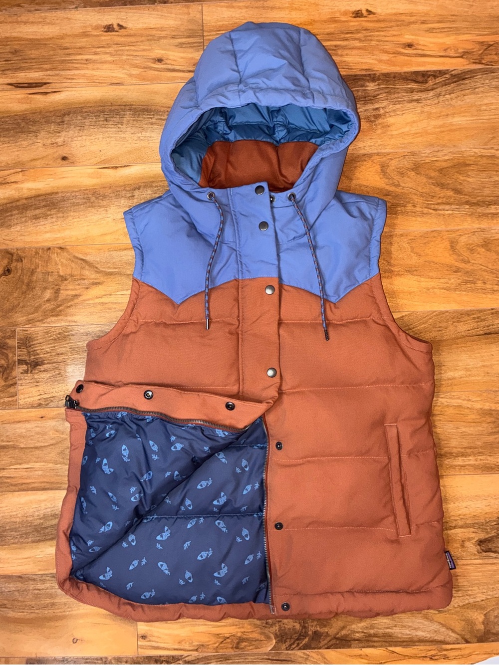Patagonia Women’s Bivy Down Hooded Puffer Vest Sisu Brown (blue/orange)- size L